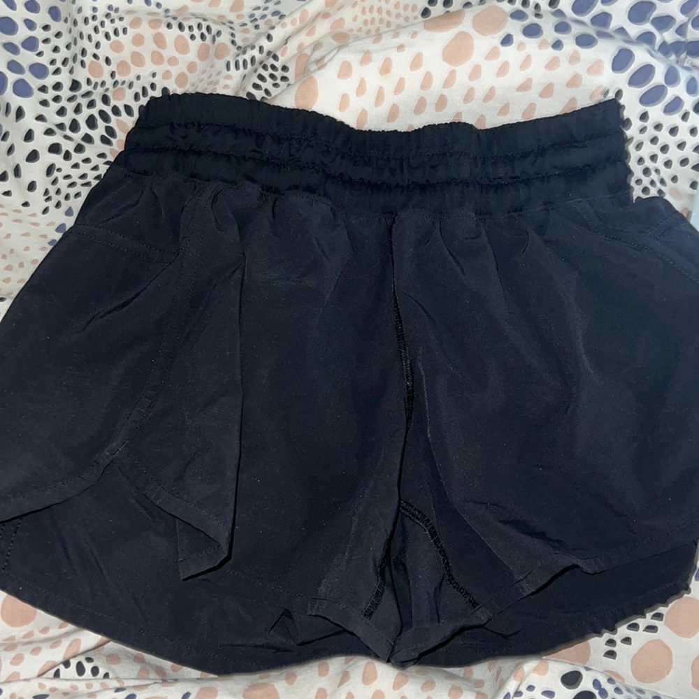 Track that high-rise lined Lululemon 3 inch shorts in black.